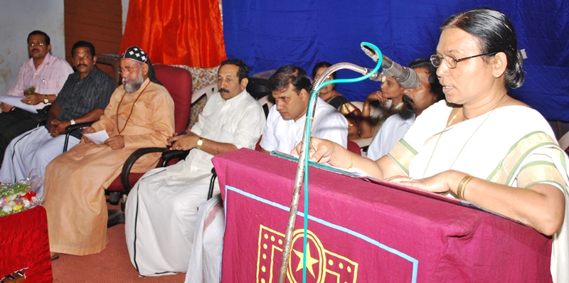 Report presentation : Head Mistress Smt. K V Omana 